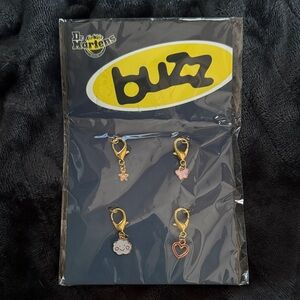 Dr. Martens Buzz Charm Collection with Gold and Pink Accents